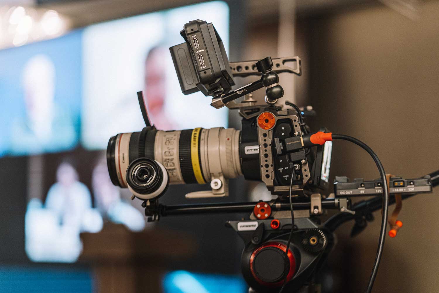 Event videography team filming conference in Barcelona with professional cinema camera